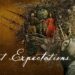 How does Dickens’s novel Great Expectations engage with the theme of upward social mobility and self-improvement